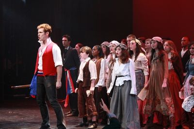 Tyler Hanes with students Photo