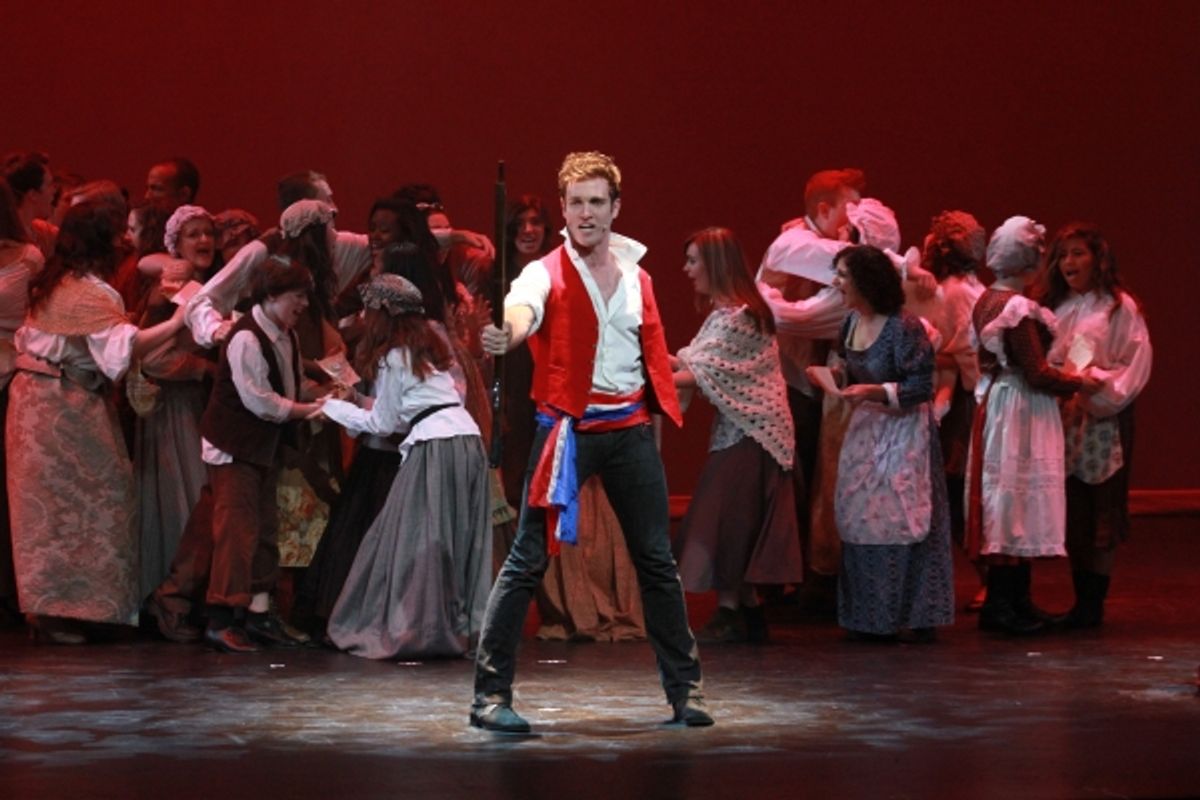 Tyler Hanes with students at 