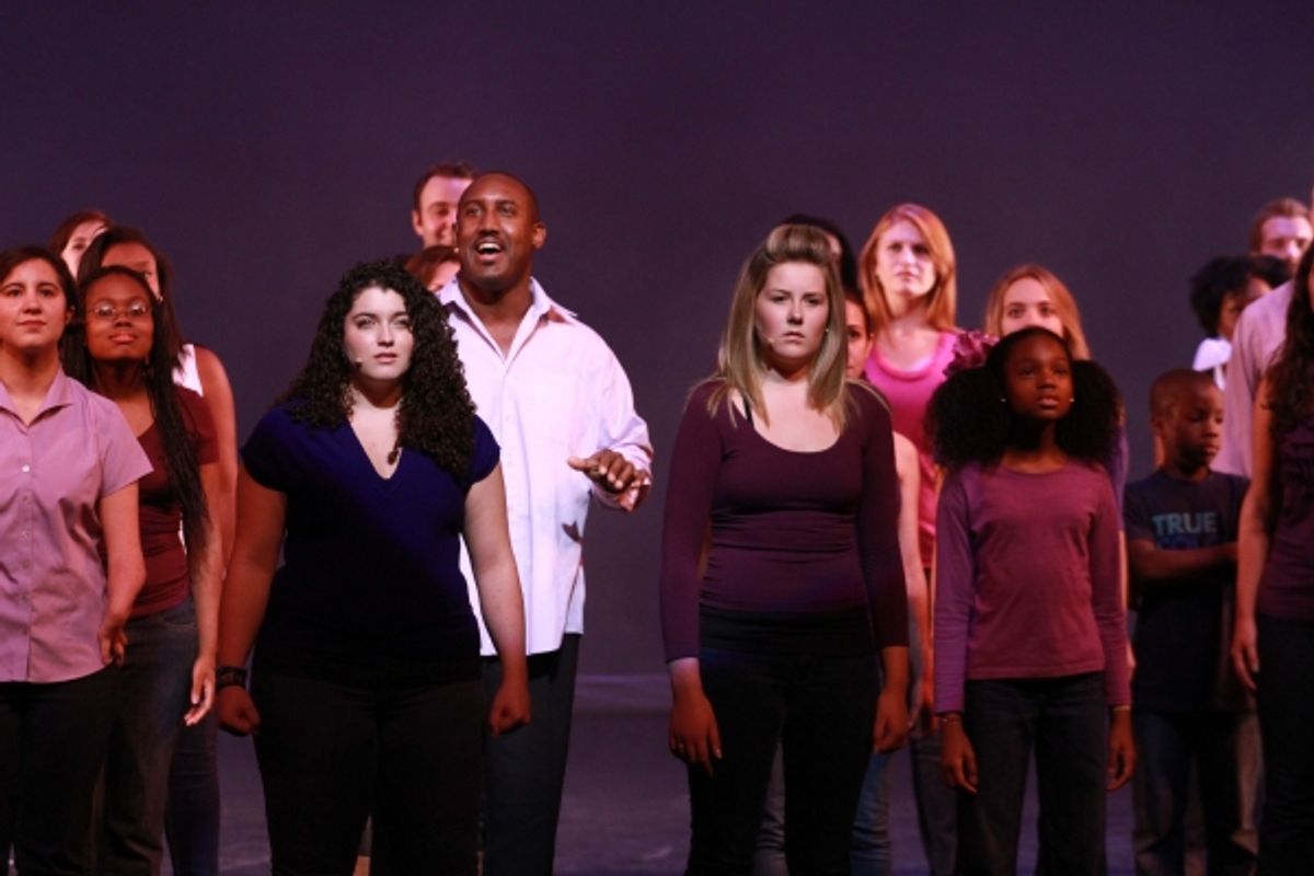 Quentin Earl Darrington with students at 