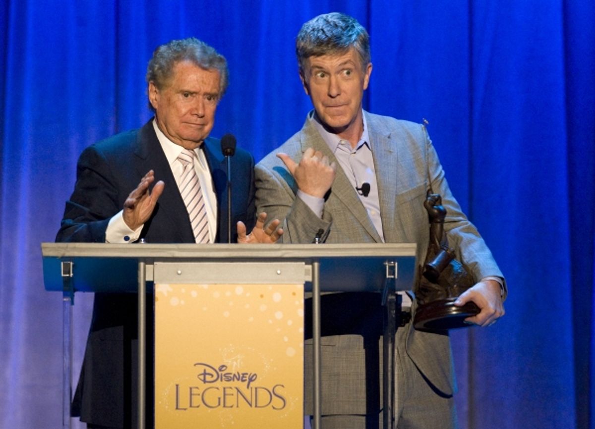 Aug. 19, 2011 - Anaheim, California, U.S. - Regis Philbin accepts his Disney Legend Award from Tom Bergeron during a ceremony at the Anaheim Convention Center Friday...///ADDITIONAL INFO: n.d23.0820 - 8/19/11  - PHOTO BY JOSHUA SUDOCK, THE ORANGE COUNTY R at 