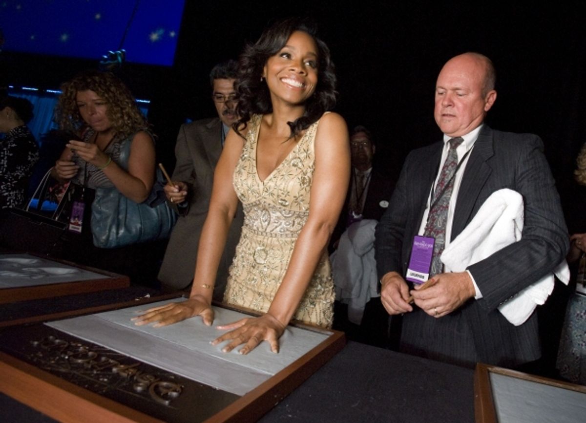 Anika Noni Rose, voice of Princess Tiana in Disney's animated feature ''The Princess and the Frog,'' accepts her Disney Legend Award during a ceremony at the Anaheim Convention Center Friday at 