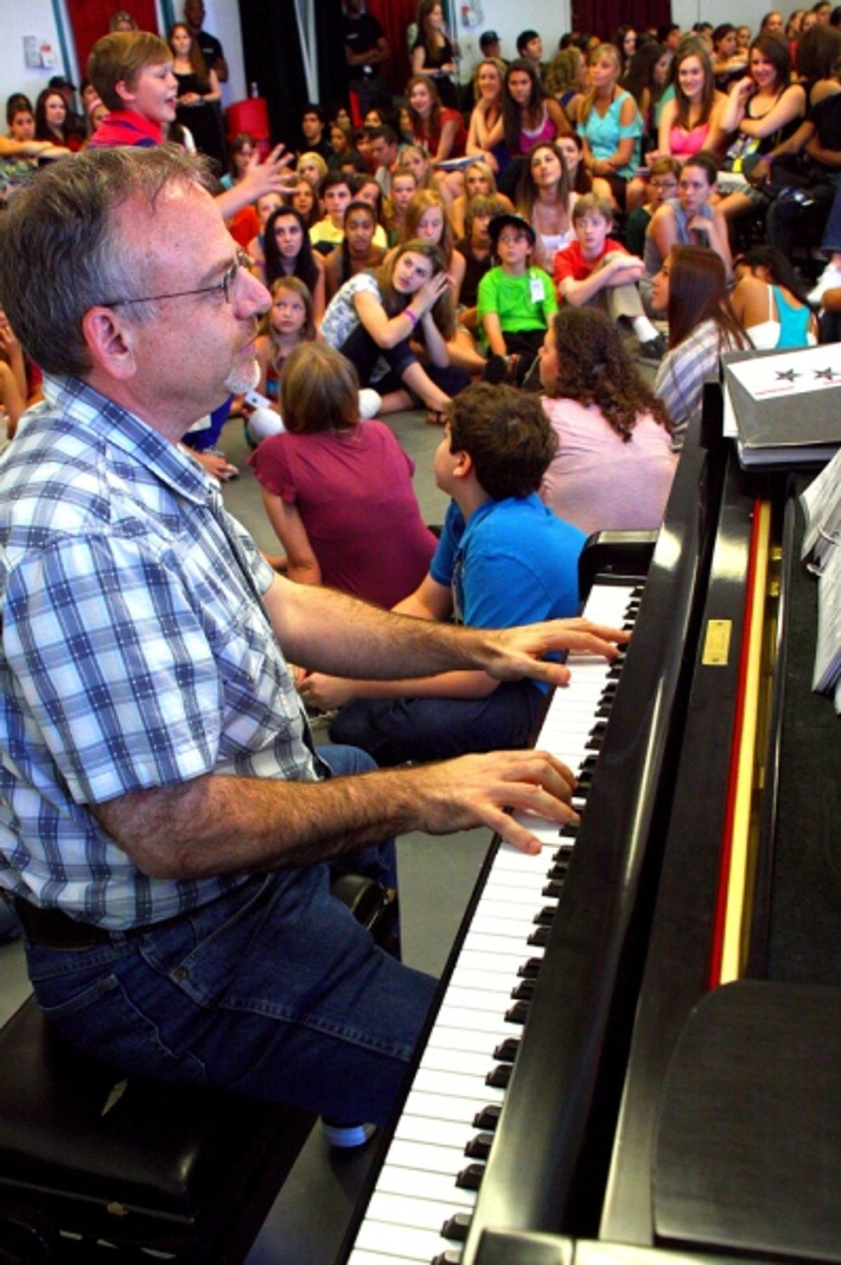 Marc Shaiman accompanies a student at 