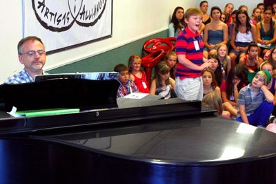 Marc Shaiman accompanies a student Photo