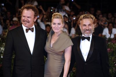 John C. Reilly, Kate Winslet and Christoph Waltz.  Photo