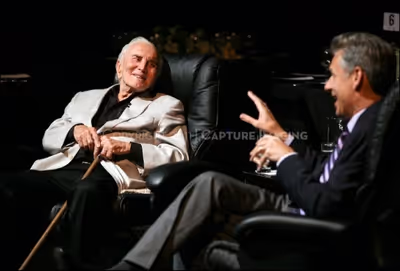 Kirk Douglas (L) talks on stage with CTG Artistic Director Michael Ritchie 
 Photo