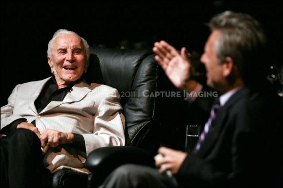 Kirk Douglas (L) talks on stage with CTG Artistic Director Michael Ritchie 
 at 