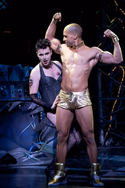 (from left) Matt McGrath as Frank 'N' Furter and Sydney James Harcourt as Rocky in Ri Photo