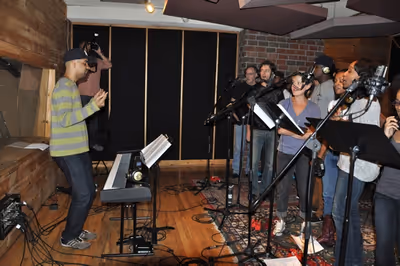 Jason Michael Webb rehearsing the cast Photo