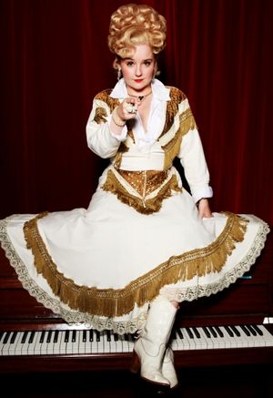 Sarah Lark as Miss Mona Photo