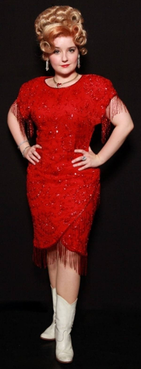 Sarah Lark as Miss Mona Photo