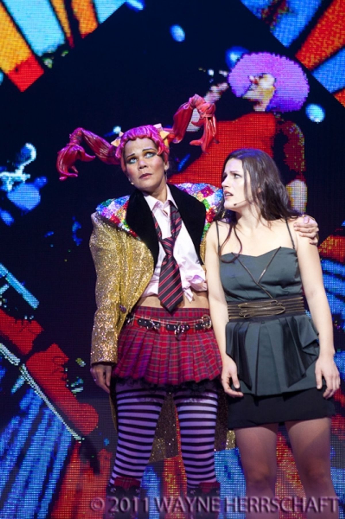 Lourds Lane and Carrie Manolakos at 