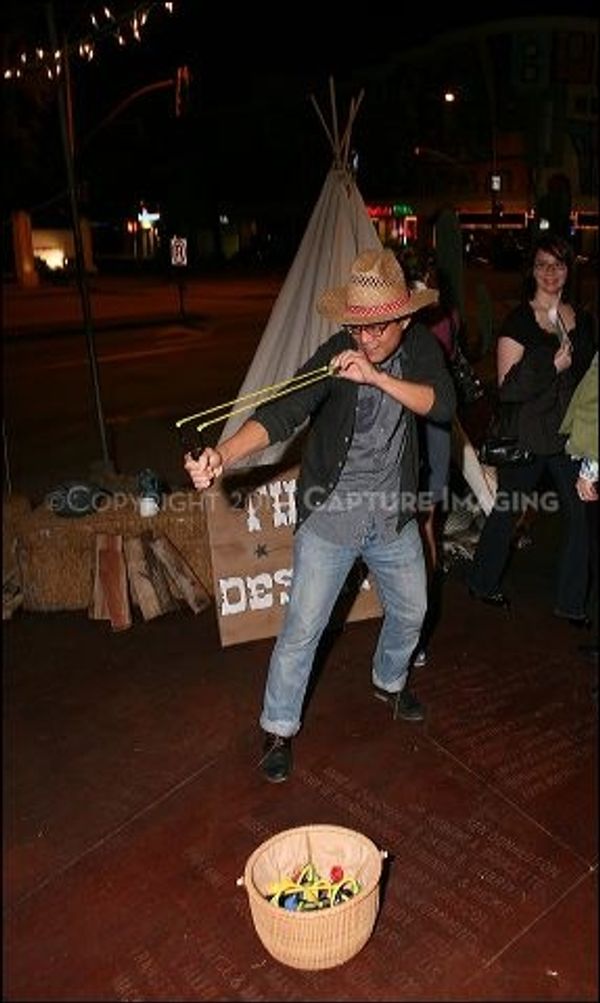 CULVER CITY, CA - OCTOBER 8: Nitai Cook plays games during the shindig for the openin Photo