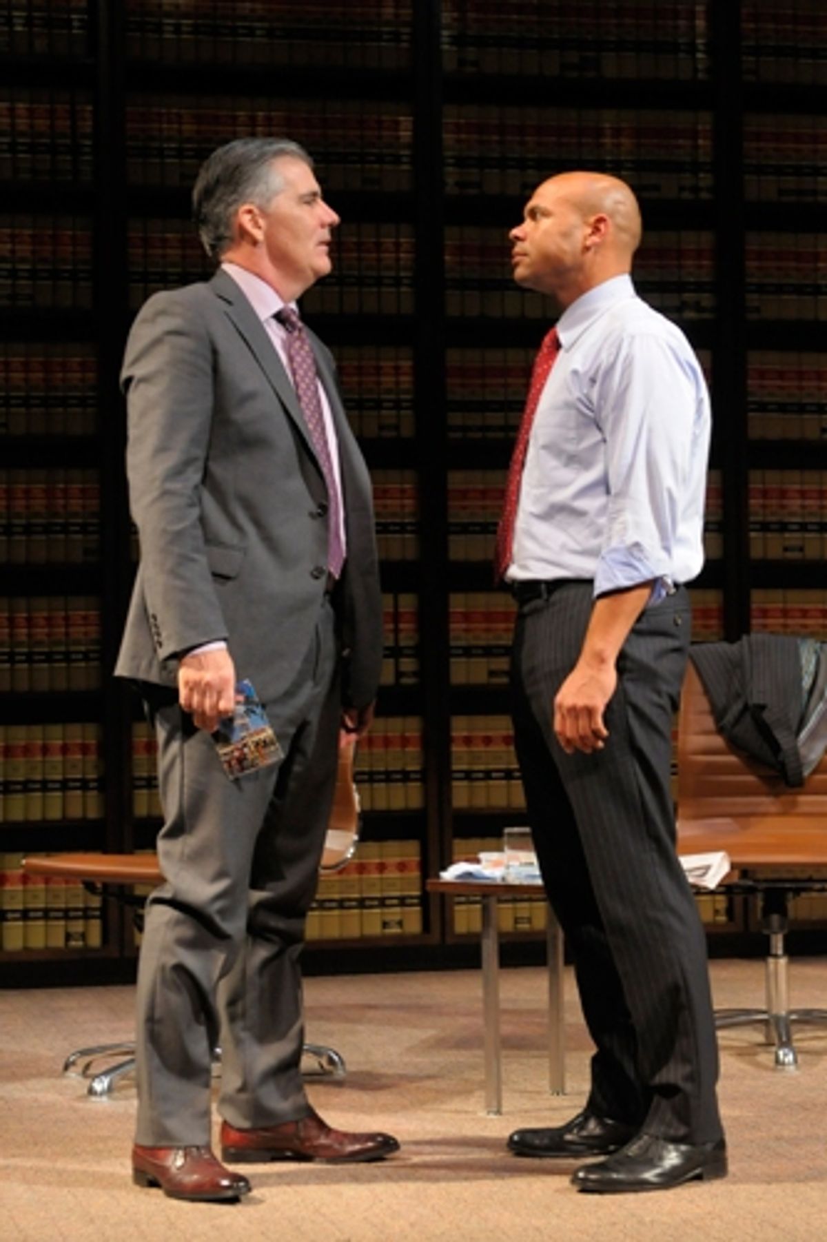 Law firm partner Henry Brown (Chris Butler, right) faces off with wealthy client Charles Strickland (Kevin OÃ¢â‚¬â„¢Rourke). at 