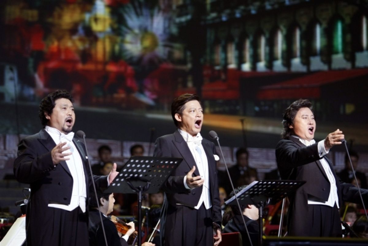  BEIJING, Oct. 22, 2011 Singer Dai Yuqian (R), Mo Hualun (C) and Wei Song perform during a vocal concert in Beijing, capital of China, Oct. 21, 2011. The Beijing concert of the Three Chinese Tenors World Tour was held here on Friday. (Credit Image: Ã‚Â© Y at 