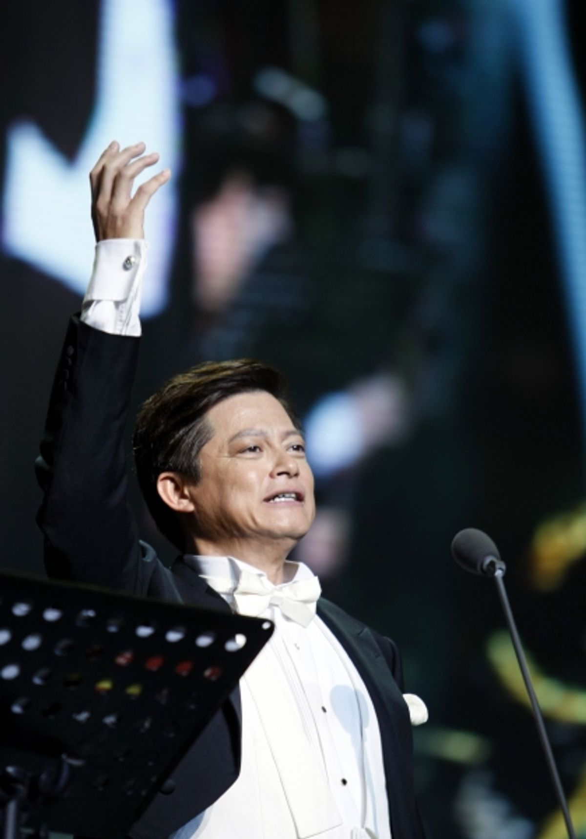  BEIJING, Oct. 22, 2011 Singer Mo Hualun performs during a vocal concert in Beijing, capital of China, Oct. 21, 2011. The Beijing concert of the Three Chinese Tenors World Tour was held here on Friday. (Credit Image: Ã‚Â© Yang Huifeng/Xinhua/ZUMAPRESS.com at 