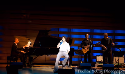 Josh Young sings "Muddy Water" Photo
