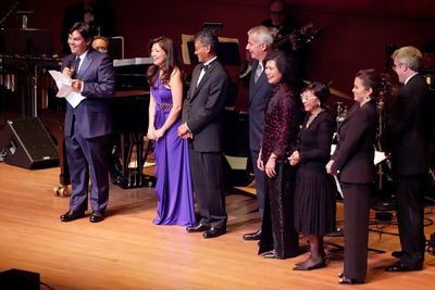 Honoring Robert Lopez with an Award of Excellence are (L-R) Ronna Reyes Sieh, Dado Ba Photo