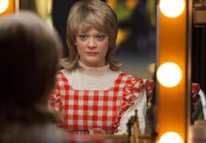 GLEE: A young Sue Sylvester (Colby Minifie) gets ready to perform in high school in t Photo