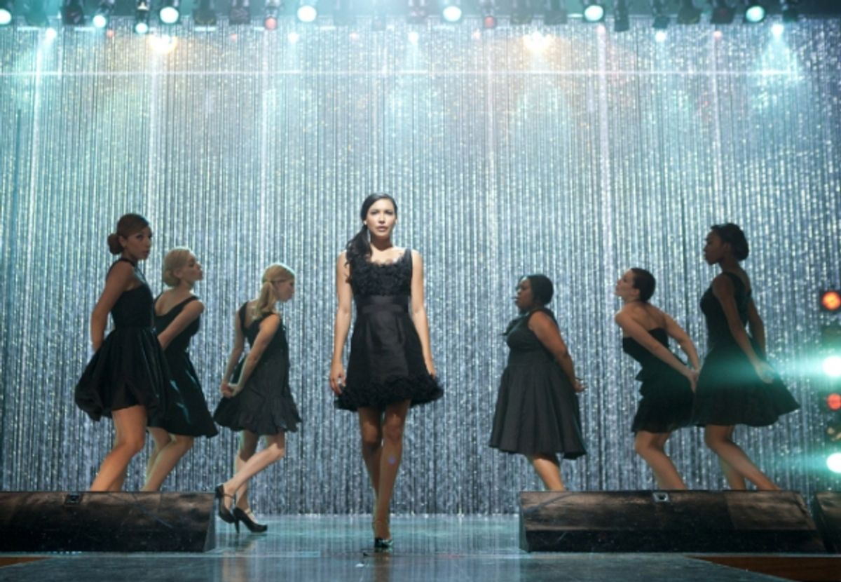 GLEE: Santana (Naya Rivera, C) performs the 300th musical performance of GLEE in the &quot;Mash Off&quot; episode airing Tuesday, Nov. 15 (8:00-9:00 PM ET/PT on FOX. &#xa9; Fox Broadcasting Co. Cr: Adam Rose/FOX at 