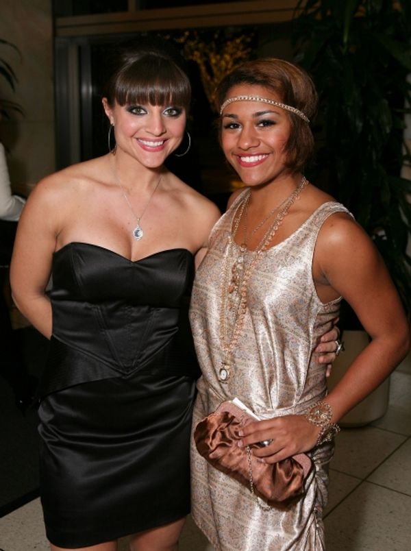 LOS ANGELES, CA - NOVEMBER 11: Cast members Haley Hannah (L) and Ariana DeBose (R) po Photo