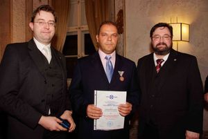 Nikos Kostakos, President of the George Best Costacos Foundation in Greece receiving the Gold Medal of Humanitarian Merit from the Austrian Albert Schweitzer Society @ BroadwayWorld Nikos Kostakos, President of the George Best Costacos Foundation in Greece receiving Photo