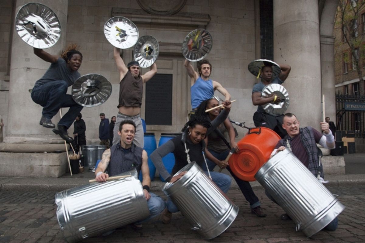 Nov. 14, 2011 - London, England, United Kingdom - West End staple and worldwide hit musical 'Stomp,' created by Luke Cresswell and Steve McNicholas, celebrates its 20th anniversary with a  public performance by the UK cast in Covent Garden's Piazza. (Cred at 