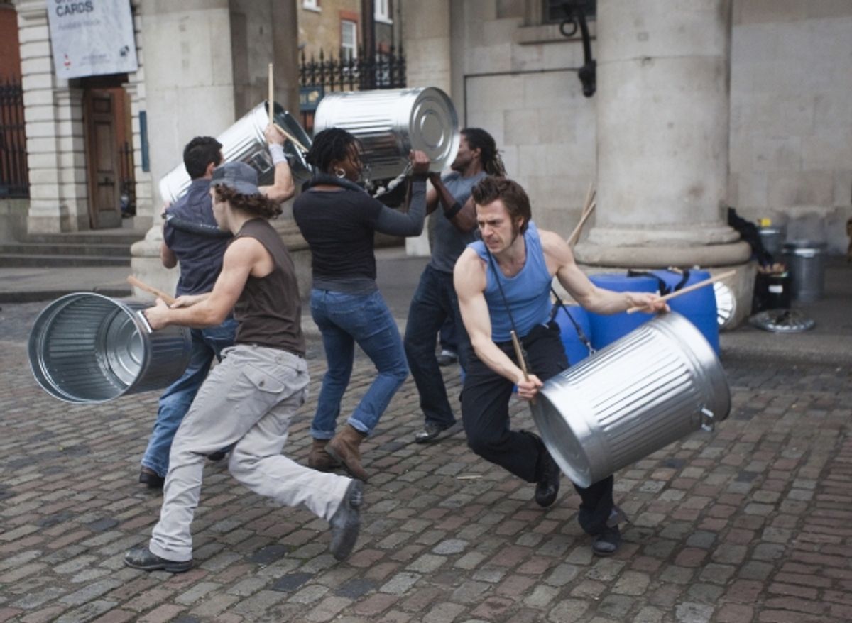 Nov. 14, 2011 - London, England, UK -  London, UK. Hit-musical ''Stomp'', created by Luke Cresswell and Steve McNicholas, celebrates its 20th anniversary with a  public performance by the original UK cast in Covent Garden's Piazza. Photo credit: Bettina S at 