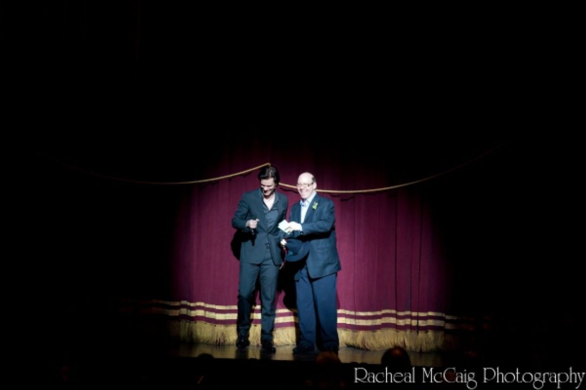 Aubrey Dan introduces Peter Deiwick to sing the National Anthem at 