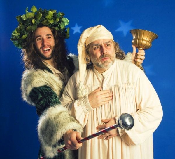 Michael Borges (standing in for Dennis Stowe) as Christmas Present and David Benoit a Photo