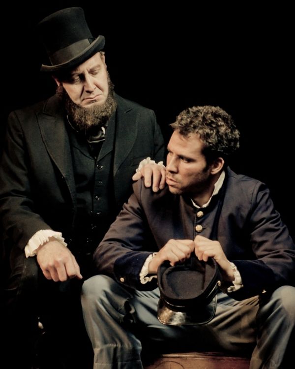 President Lincoln (Fred Wagner) offers comfort to a Union soldier (Santino Craven) in Photo