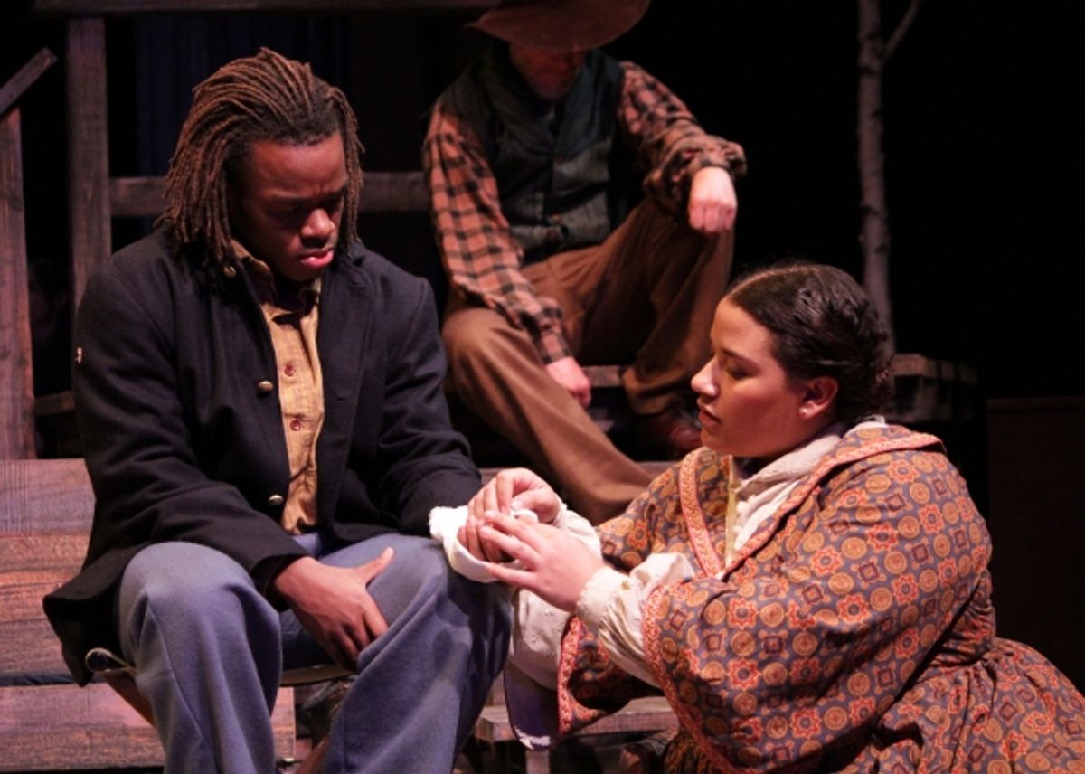 A nurse (Alicia Dansby) wraps the wound of a soldier (Jackson Hurst) in A Civil War Christmas.  at 