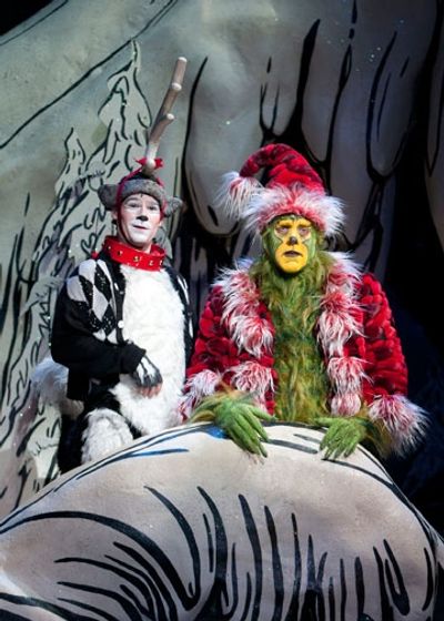Logan Lipton as Young Max and Steve Blanchard as The Grinch Photo
