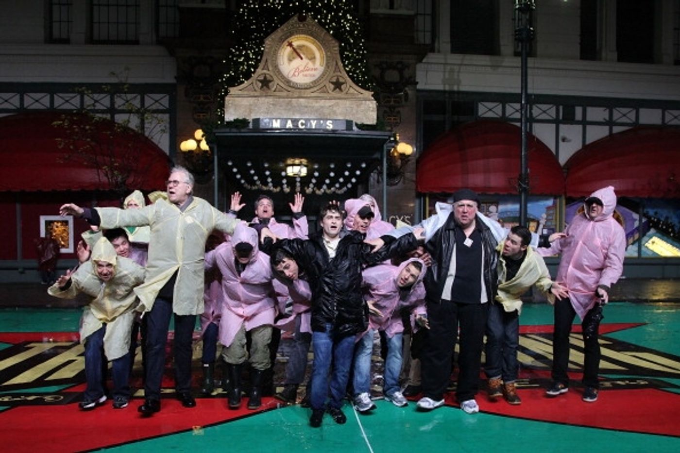 Photo Flash: Daniel Radcliffe, John Larroquette & HOW TO SUCCEED Cast Rehearse for Thanksgiving Day Parade in the Rain!  Image