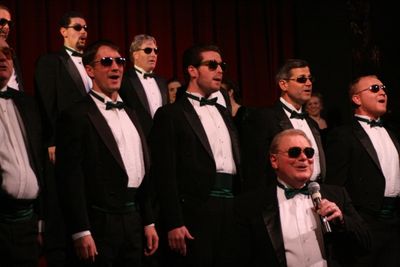Buddy Bergeron (bottom) leads the Reagle "beach boys" in "Merry Christmas, Reindeer: Photo