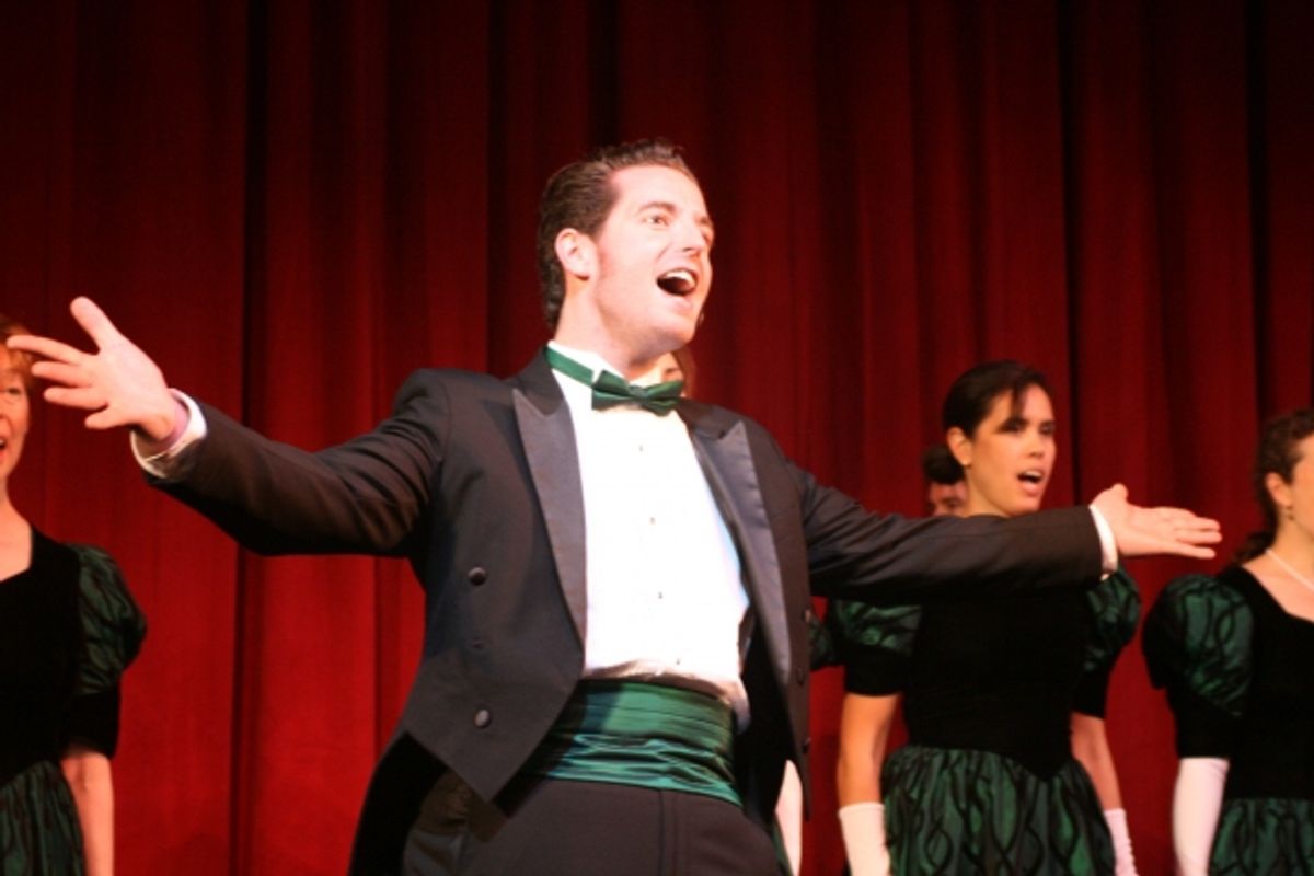 Christopher King leads the adult choir in Christmas favorites at 