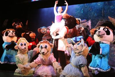 Scott Abreu as the Bear Captain and Brianna Maguire as Clara with the Teddy Bear ense Photo