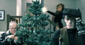 L-R: Mike Pearl as Scrooge, Kellie Rae Rockey as Ghost of Christmas Past and Brandon  Photo