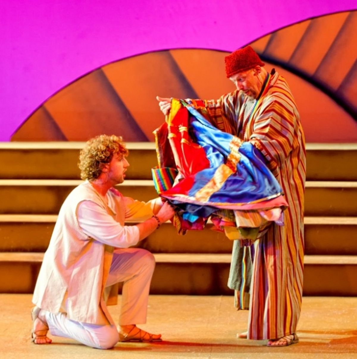 Left to right, Matthew Ryan Thompson (kneeling) as Joseph and Tim Tavcar as Jacob in Beck CenterÃ¢â‚¬â„¢s encore production of Joseph and the Amazing Technicolor Dreamcoat on the Mackey Main Stage through December 31, 2011. at 