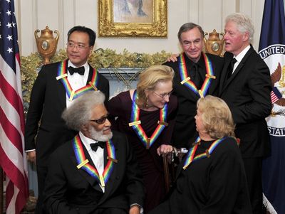 Back row, Yo-Yo Ma, Meryl Streep, Neil Diamond, Bill Clinton. Front row, Sonny Rollin Photo