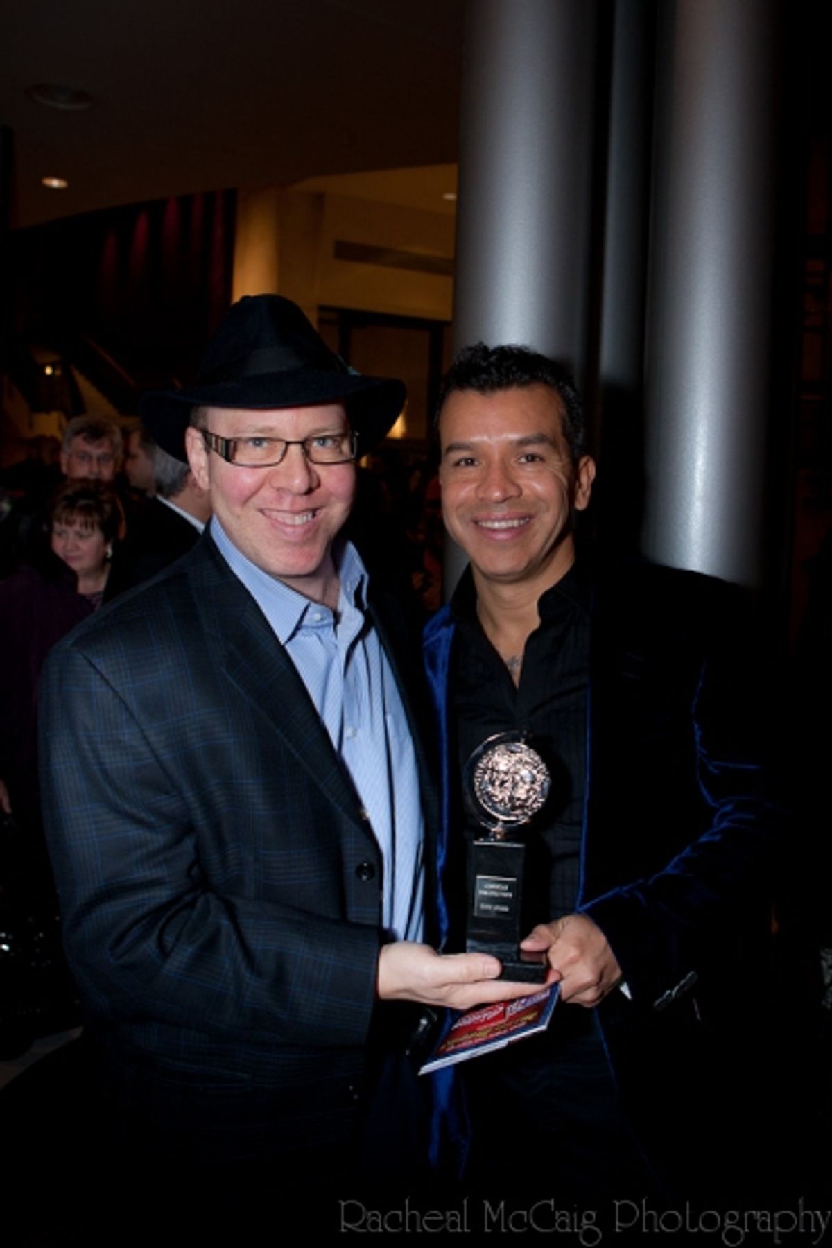 Aubrey Dan and Sergio Trujillo pose with The Tony Award at 
