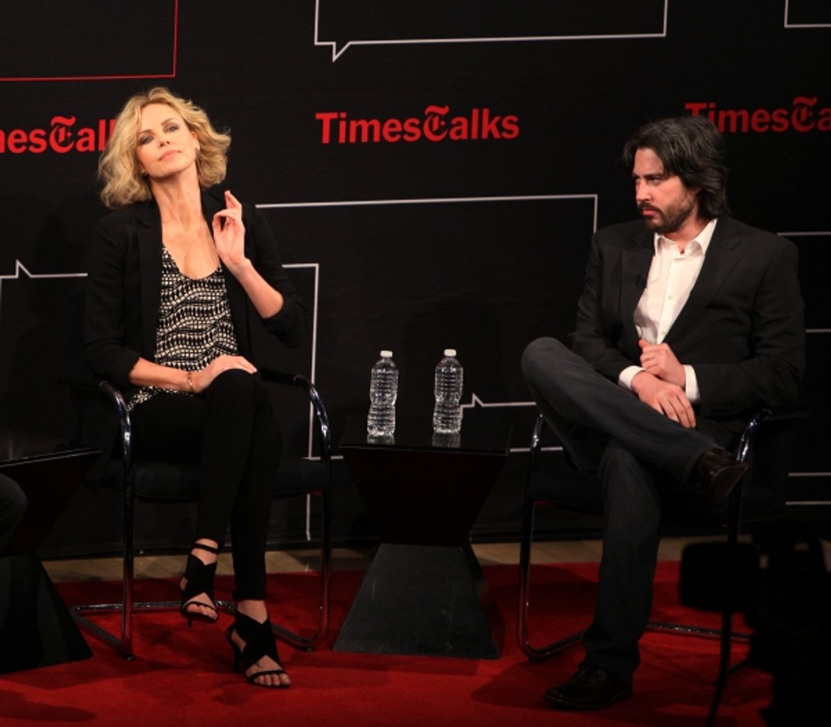 Charlize Theron & Jason Reitman with Charles McGrath attending TimesTalks Presents A Conversation With Charlize Theron And Jason Reitman at the Times Center in New York City, December 9, 2011.  Ã‚Â© Walter McBride / WM Photography / Retna Ltd. at 