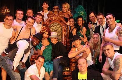 Taye Diggs and Idina Menzel posing with the cast of ABSINTHE Photo