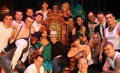 Taye Diggs and Idina Menzel posing with the cast of ABSINTHE Photo