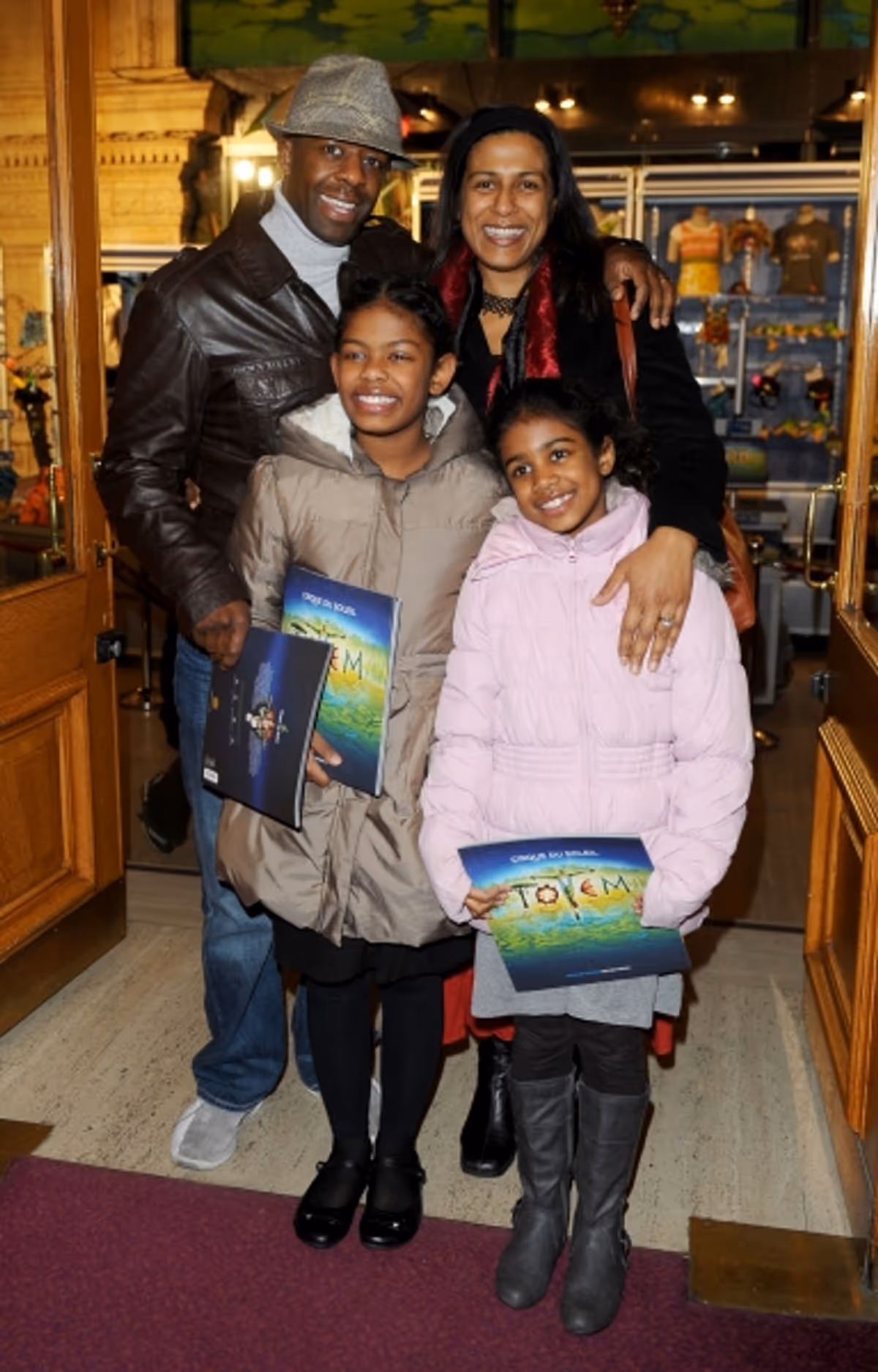Adrian Lester and Lolita Chakrabarti with daughters Lila and Jasmine at 