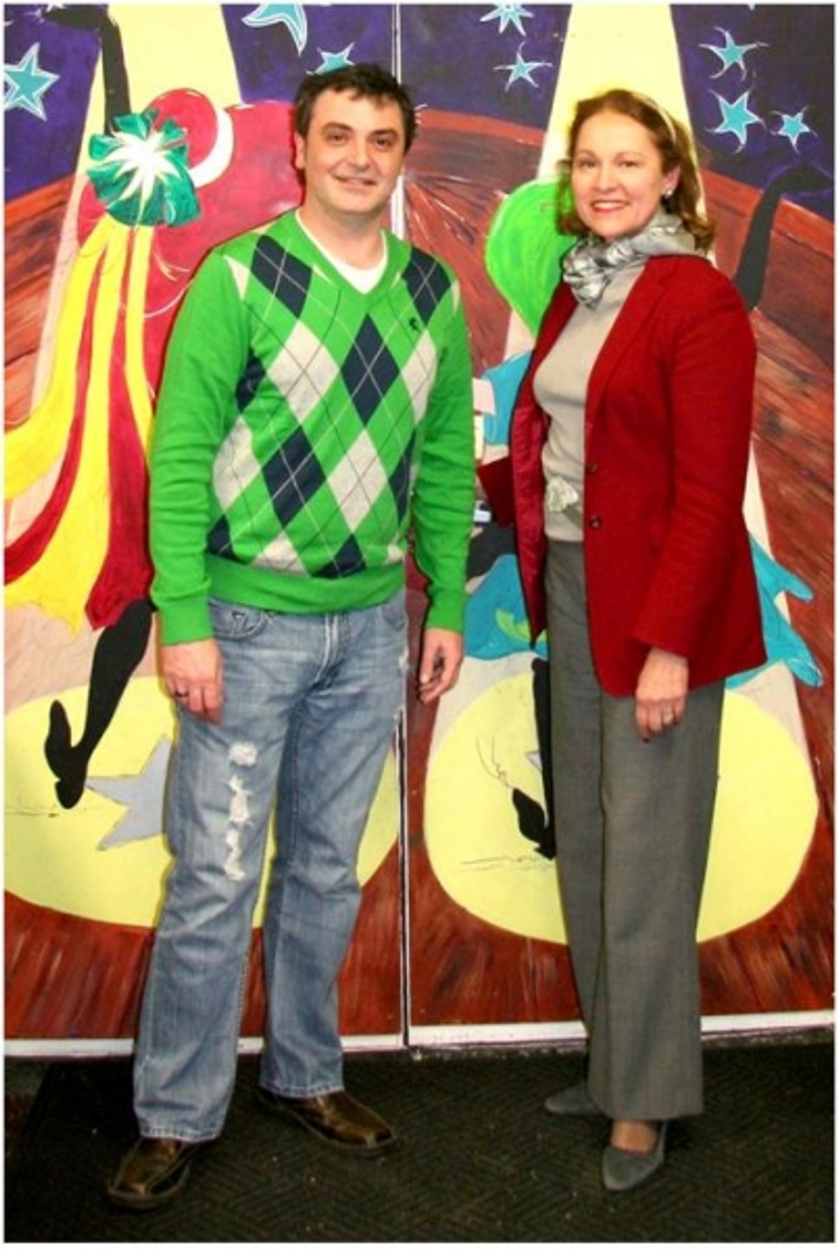 Gregory Magyar, Executive Artistic Director of KVPAC, and Minnette Boesel, Mayor's Assistant for Cultural Affairs, stand in front of the doors to the ExhibitForce Main Theatre at KVPAC. at 