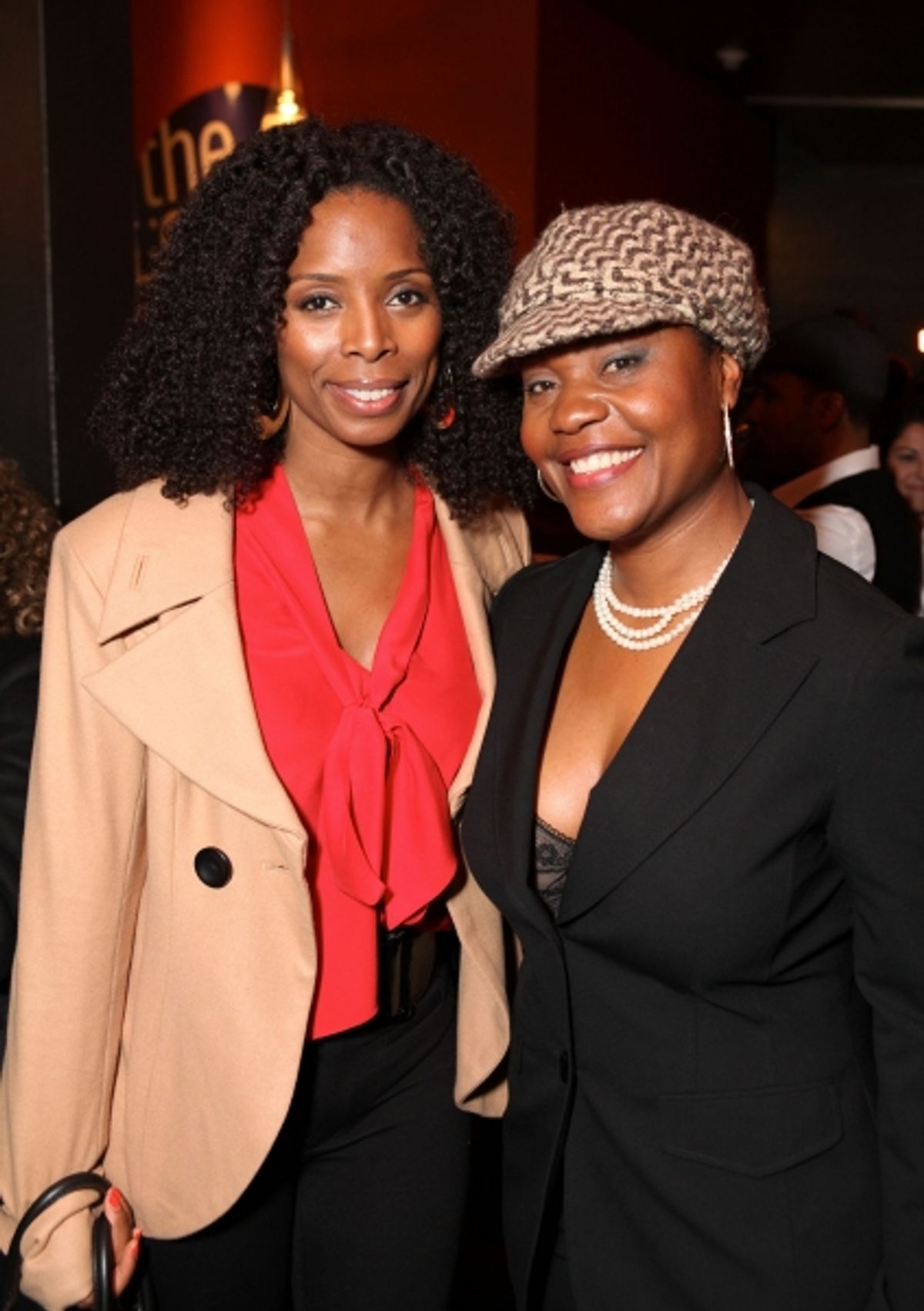 CULVER CITY, CA - JANUARY 22: Tasha Smith (L) and cast member Deidrie Henry (R) pose during the party for the opening night performance of Ebony Repertory Theatre's production of 'A Raisin in the Sun' at Center Theatre Group / Kirk Douglas Theatre at 