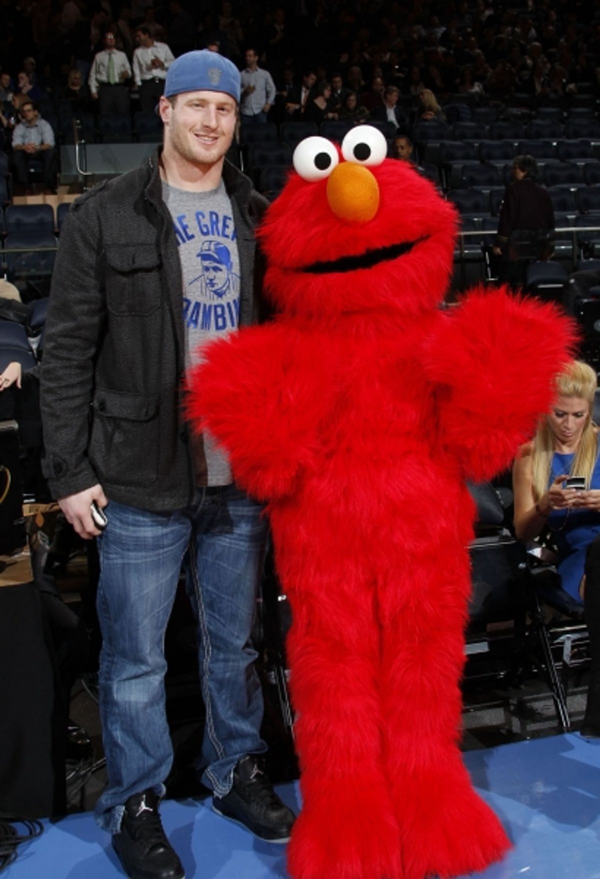 Elmo poses with New York Giant Jake Ballard at 