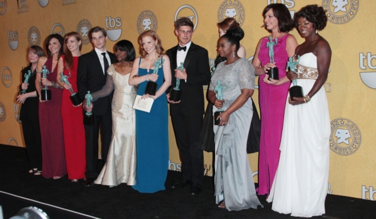 The cast of 'The Help' pose in the press room with their award for Outstanding Performance By A Cast In A Motion Picture for 'The Help' pictured at the 18th Annual Screen Actors Guild Awards - Press Room held at the Shrine Auditorium and Exposition Center at 