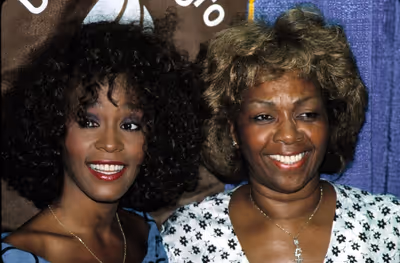 Whitney Houston with her mother Cissy Houston reveives the United Negro College Fund  Photo