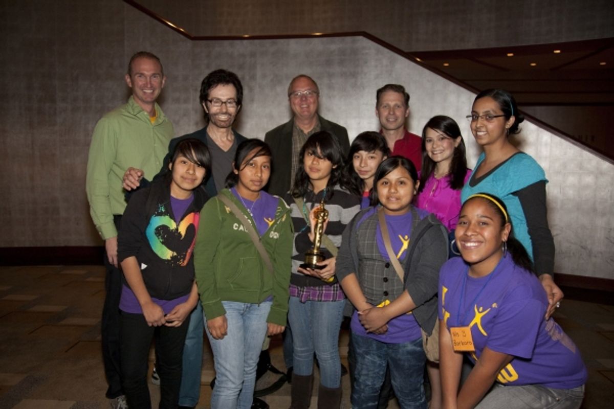 Michael McCloud (Teacher), George Chakiris, Randy Haberkamp, Tony Hoover and Romi Dames, Barbara Banks (AVID Tutor) and Ms. Misra (teacher) with Carver School 7th grade students Norma Munoz, Catarina Juan, Melissa Juan, Osiris Moreno, Vanessa Flores